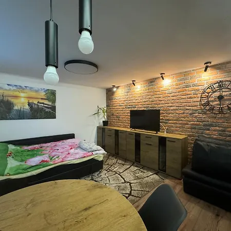 M1 W Centrum Wiela Апартаменты *